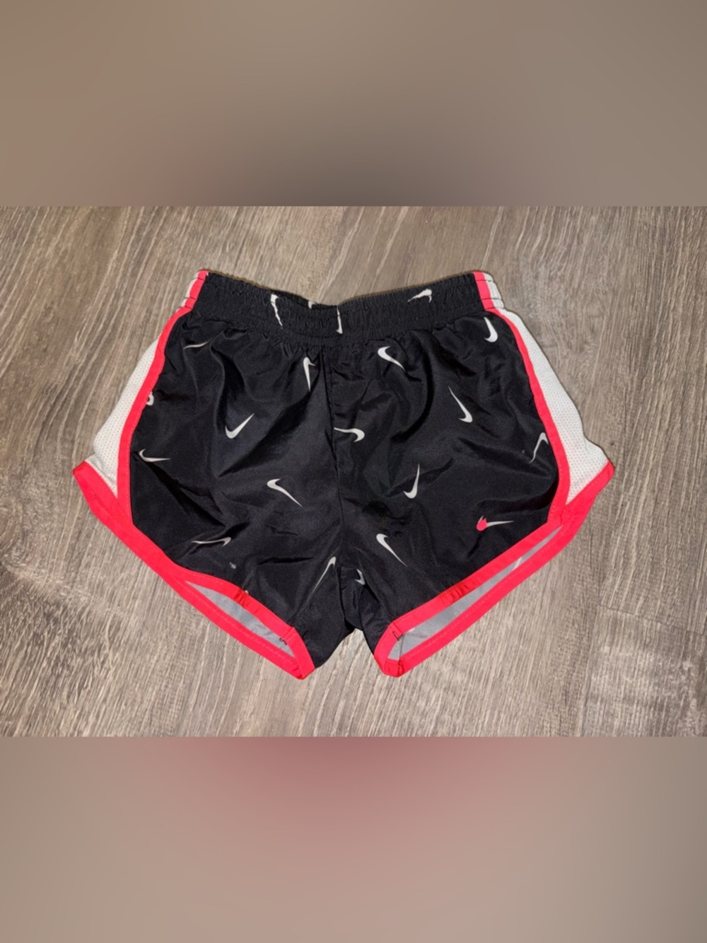 Nike Black Shorts with Hot Pink Trim and White Swooshes